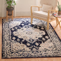 SAFAVIEH Monaco Collection Area Rug - 8 x 10, Ivory & Navy, Boho Chic Medallion Distressed Design, Non-Shedding & Easy Care, I
