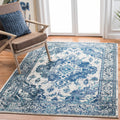 SAFAVIEH Monaco Collection Area Rug - 8 x 10, Ivory & Blue, Boho Chic Medallion Distressed Design, Non-Shedding & Easy Care, I