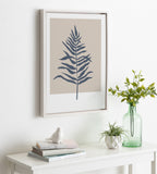 Sylvie Muted Tan and Blue Colorblock Botanical Fern Framed Canvas by The Creative Bunch Studio