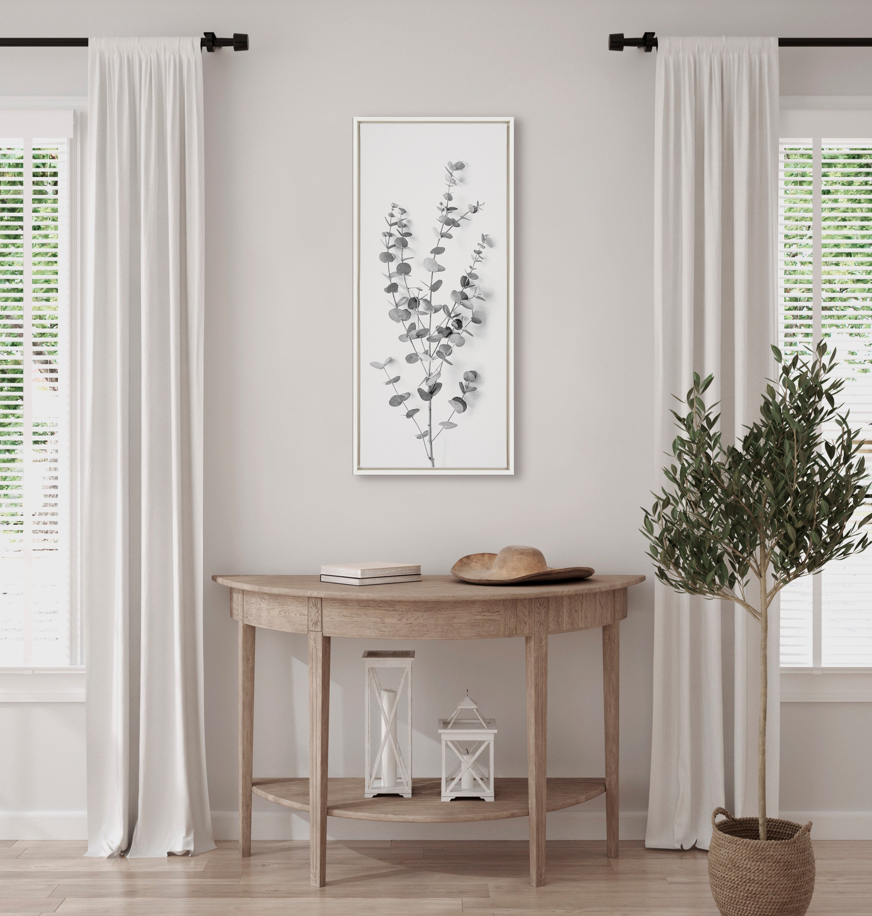 Sylvie Eucalyptus Botanical I Gray and Soft White Framed Canvas by The Creative Bunch Studio